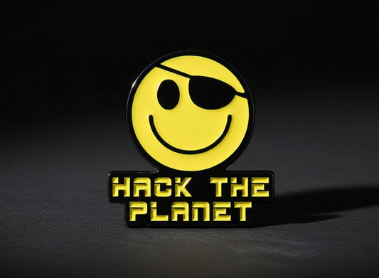 Yellow smiley face badge with eyepatch and 'Hack the Planet' text on a dark background